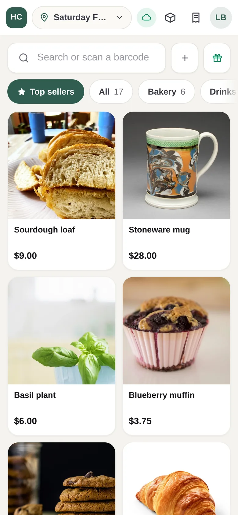 The register on a phone: product tiles with photos and category chips.